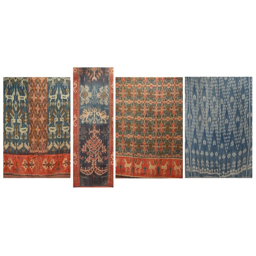 239 - FOUR 20TH CENTURY INDONESIAN (SUMBA) COTTON IKAT HINGGI IN SIZES. Comprising: an example with stylis... 