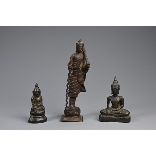 209 - THREE SOUTH EAST ASIAN BRONZE MODELS OF BUDDHAS. Comprising: a buddha Shakyamuni, Laos, seated in dh... 