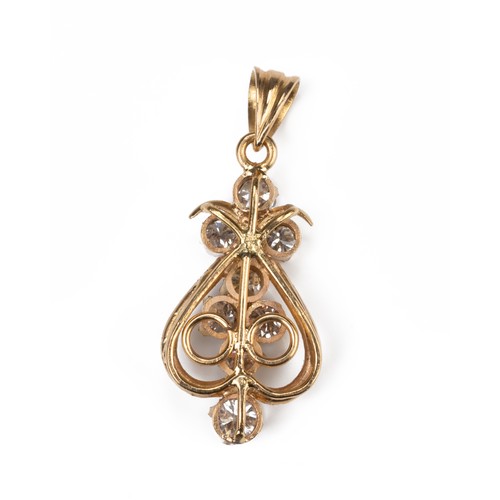 48 - A HIGH CARAT YELLOW GOLD DIAMOND PENDANT, MID 20TH CENTURY. Eight round cut diamonds in openwork mou... 