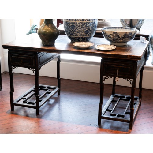 247 - A CHINESE TWIN PEDESTAL DESK, QING DYNASTY, WITH REPLACEMENT TOP. Stained, probably elm, the matched... 