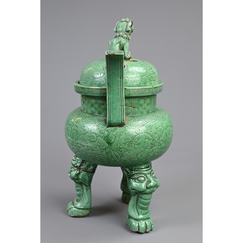 165 - A LARGE CHINESE GREEN GLAZED PORCELAIN TRIPOD CENSER AND COVER, 19/20TH CENTURY. Raised on three myt... 