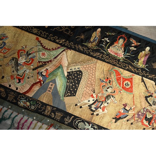 237 - A VERY LARGE EARLY 20TH CENTURY CHINESE EMBROIDERED SILK AND GOLD THREAD TEMPLE HANGING DEPICTING AN... 