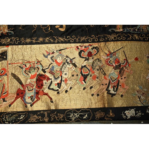 237 - A VERY LARGE EARLY 20TH CENTURY CHINESE EMBROIDERED SILK AND GOLD THREAD TEMPLE HANGING DEPICTING AN... 