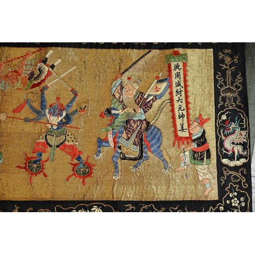 237 - A VERY LARGE EARLY 20TH CENTURY CHINESE EMBROIDERED SILK AND GOLD THREAD TEMPLE HANGING DEPICTING AN... 