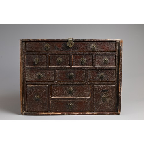 328 - A CHINESE LACQUERED APOTHECARY CABINET, 19TH CENTURY. Of rectangular form with twelve drawers and me... 