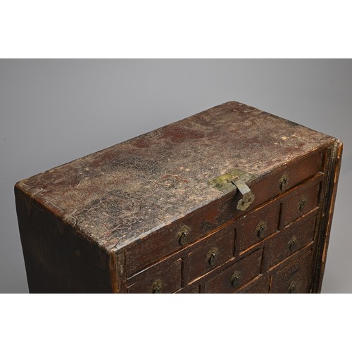 328 - A CHINESE LACQUERED APOTHECARY CABINET, 19TH CENTURY. Of rectangular form with twelve drawers and me... 