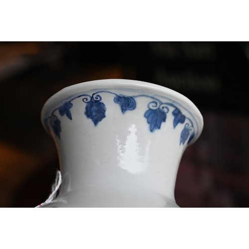 89 - A CHINESE BLUE AND WHITE PORCELAIN VASE, EARLY 18TH CENTURY. Cylindrical body on gently everted foot... 