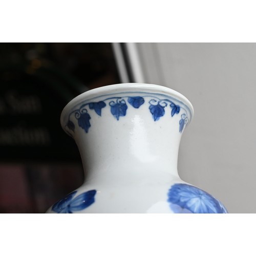 89 - A CHINESE BLUE AND WHITE PORCELAIN VASE, EARLY 18TH CENTURY. Cylindrical body on gently everted foot... 