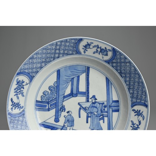 60 - A CHINESE BLUE AND WHITE PORCELAIN SHALLOW BOWL, 18TH CENTURY. Decorated with scene of scholar and a... 