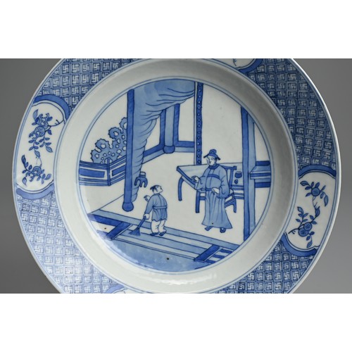 60 - A CHINESE BLUE AND WHITE PORCELAIN SHALLOW BOWL, 18TH CENTURY. Decorated with scene of scholar and a... 