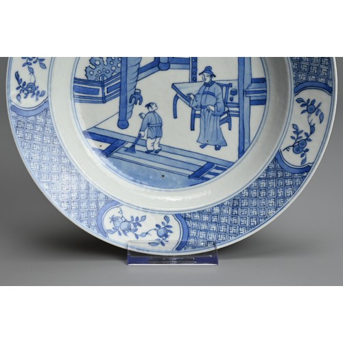 60 - A CHINESE BLUE AND WHITE PORCELAIN SHALLOW BOWL, 18TH CENTURY. Decorated with scene of scholar and a... 