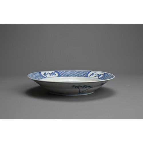 60 - A CHINESE BLUE AND WHITE PORCELAIN SHALLOW BOWL, 18TH CENTURY. Decorated with scene of scholar and a... 