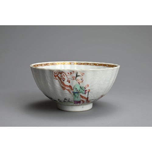 68 - A CHINESE FAMILLE ROSE PORCELAIN LOBED BOWL, 18TH CENTURY. The lobed body carved in relief with flor... 