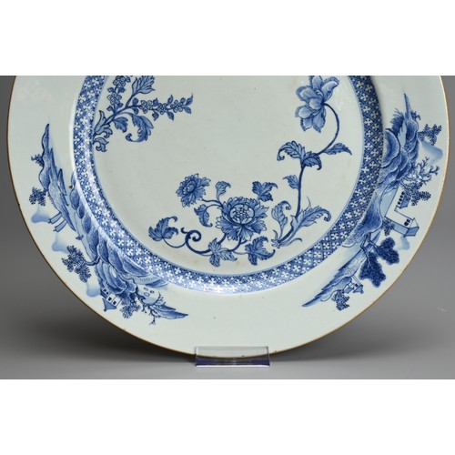 73 - A LARGE CHINESE BLUE AND WHITE PORCELAIN DISH, 18TH CENTURY. Decorated with floral sprays, a bird an... 