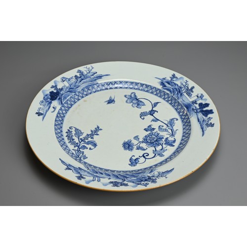 73 - A LARGE CHINESE BLUE AND WHITE PORCELAIN DISH, 18TH CENTURY. Decorated with floral sprays, a bird an... 