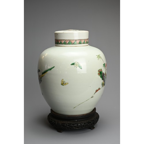 74 - A LARGE CHINESE FAMILLE VERTE PORCELAIN JAR AND COVER, LATE QING DYNASTY. Of ovoid form decorated wi... 