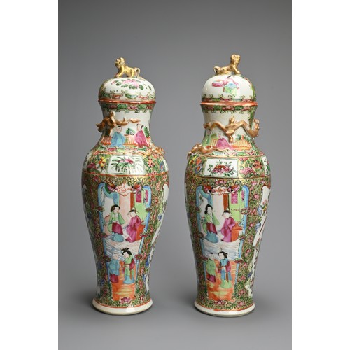 54 - A PAIR OF CHINESE CANTON FAMILLE ROSE PORCELAIN VASES AND COVERS, 19/20TH CENTURY. Of baluster form ... 