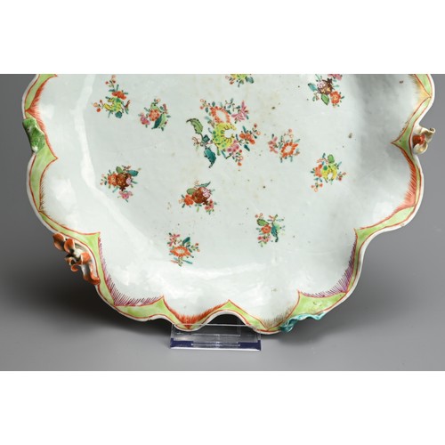 75 - A CHINESE FAMILLE ROSE PORCELAIN LOTUS DISH, 18TH CENTURY. Of lobed form in the form of a large lotu... 