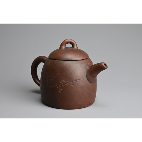 77 - A CHINESE YIXING ZISHA TEAPOT. Featuring portrait of Mao Zedong in relief with inscription. With imp... 