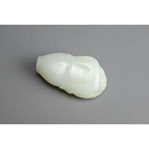 79 - A CHINESE PALE CELADON JADE FIGURE OF A BOY HOLDING A LINGZHI SPRAY. The pendant with pierced hole a... 