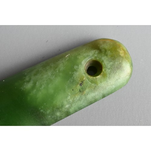 80 - A CHINESE SPINACH JADE HAT PIECE OR FITTING, QING DYNASTY. Of flattened form with pierced hole to on... 