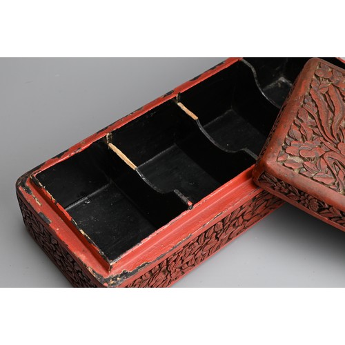 85 - A CHINESE RED LACQUER BOX AND COVER, EARLY 20TH CENTURY. Of rectangular form carved in relief with p... 