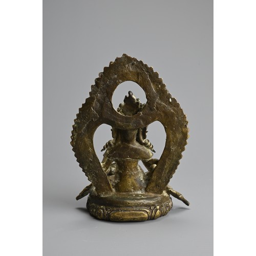 88 - A SINO TIBETAN GILT BRONZE FIGURE OF JAMBHALA, 19/20TH CENTURY. Seated on lotus base holding a mongo... 