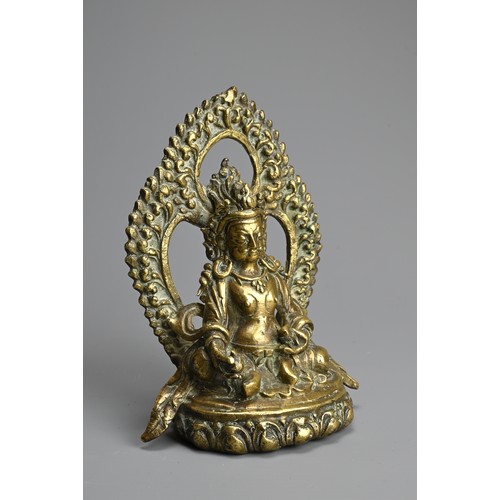 88 - A SINO TIBETAN GILT BRONZE FIGURE OF JAMBHALA, 19/20TH CENTURY. Seated on lotus base holding a mongo... 