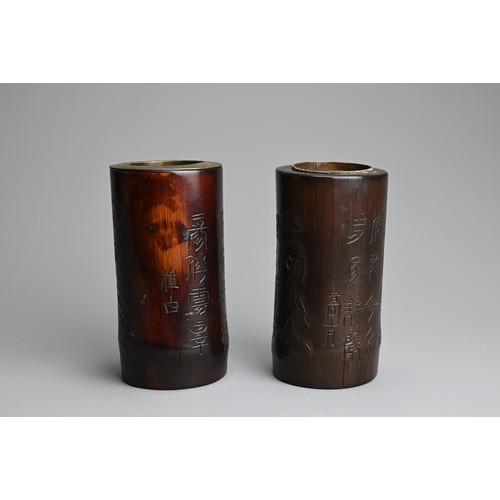 91 - TWO CHINESE METAL LINED BAMBOO BRUSH POTS, 20TH CENTURY. Each of cylindrical form carved with landsc... 