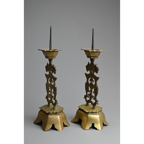 93 - A PAIR OF CHINESE POLISHED BRONZE PRICKET CANDLESTICKS, EARLY 20TH CENTURY. With pierced sections fe... 