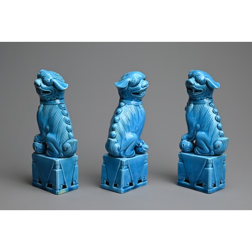 7 - THREE VINTAGE CHINESE TURQUOISE GLAZED PORCELAIN FOO DOGS, LATE 20TH CENTURY. Two males and one fema... 