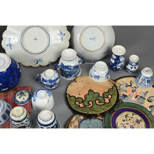 11 - A MIXED GROUP OF MAINLY CHINESE PORCELAIN AMD TEXTILES, 18 TO EARLY 20TH CENTURY. To include various... 