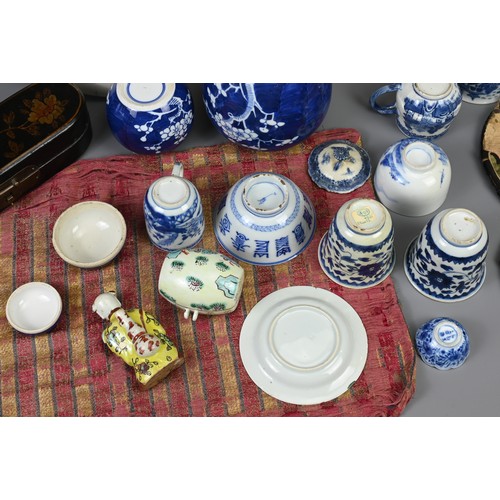 11 - A MIXED GROUP OF MAINLY CHINESE PORCELAIN AMD TEXTILES, 18 TO EARLY 20TH CENTURY. To include various... 