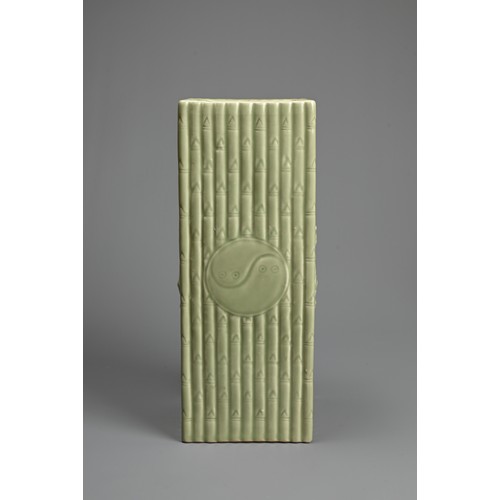 24 - A CHINESE CELADON GLAZED PORCELAIN VASE, QIANLONG MARK. Of square form moulded as rows of bamboo ste... 