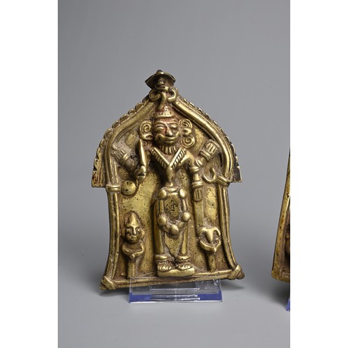 100 - TWO INDIAN BRONZE PLAQUES OF VIRBHADRA. Standing holding their attributes flanked by devotees. 13.5c... 