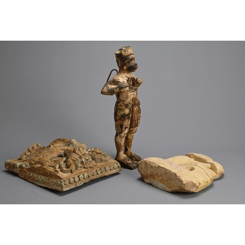 105 - TWO INDIAN CARVED WOOD ITEMS AND STONE CARVING, 20TH CENTURY. To include a carved wooden figure of H... 