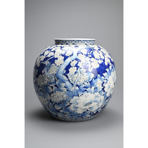 284 - A JAPANESE SETO WARE BLUE AND WHITE PORCELAIN VASE, 20TH CENTURY. Of globular form decorated through... 