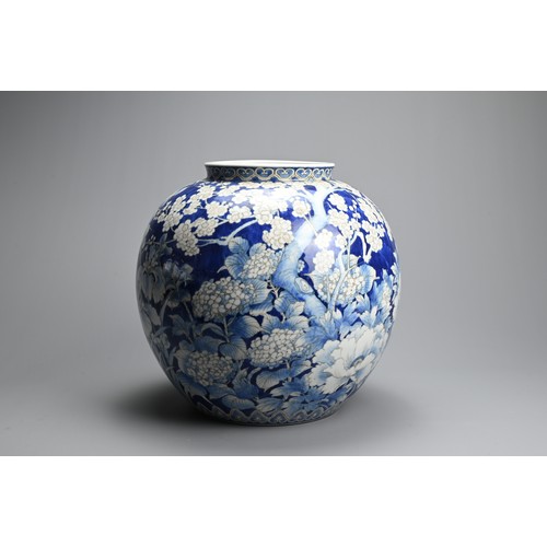 284 - A JAPANESE SETO WARE BLUE AND WHITE PORCELAIN VASE, 20TH CENTURY. Of globular form decorated through... 