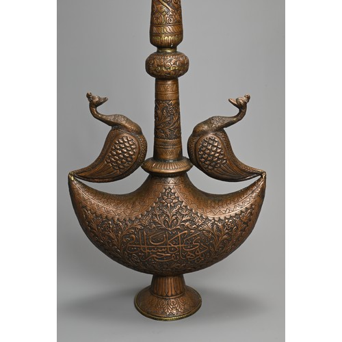 119 - A VERY LARGE DECORATIVE COPPER ISLAMIC ROSEWATER SPRINKLER, GULAB PASH. Crescent moon section on spl... 