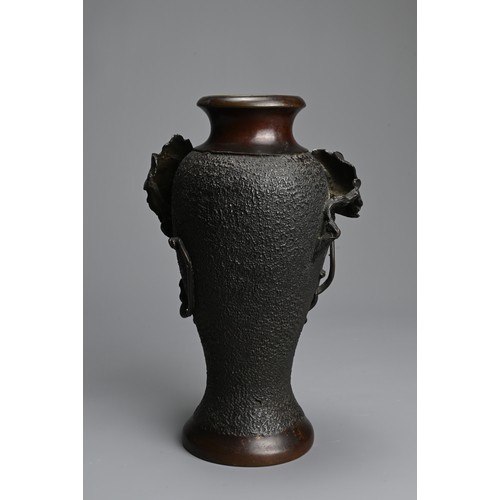 32 - A JAPANESE BRONZE VASE, 20TH CENTURY. Of baluster form cast with grapes and leafy vines. Two charact... 