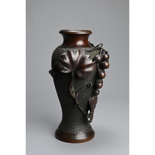 32 - A JAPANESE BRONZE VASE, 20TH CENTURY. Of baluster form cast with grapes and leafy vines. Two charact... 