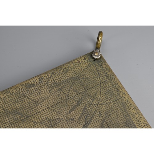 48 - AN ISLAMIC BRASS QUADRANT. Inscribed with Arabic script, projections and grids. 23cm width x 16cm no... 