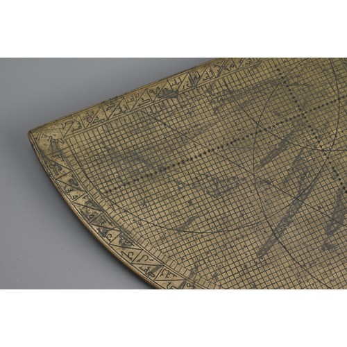 48 - AN ISLAMIC BRASS QUADRANT. Inscribed with Arabic script, projections and grids. 23cm width x 16cm no... 