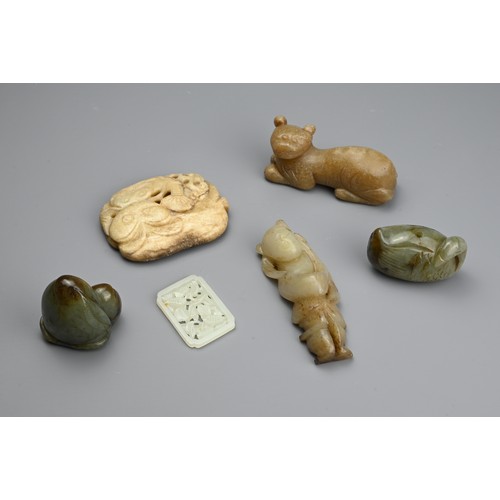 123 - SIX CHINESE JADE CARVINGS. Comprising: a pale jade plaque-shaped pendant, pierced with insects among... 