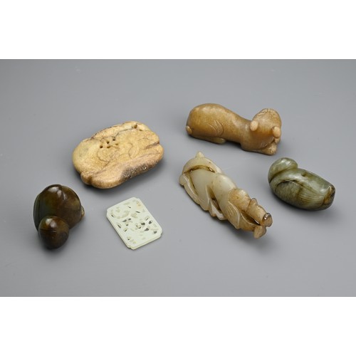 123 - SIX CHINESE JADE CARVINGS. Comprising: a pale jade plaque-shaped pendant, pierced with insects among... 