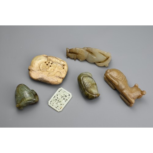 123 - SIX CHINESE JADE CARVINGS. Comprising: a pale jade plaque-shaped pendant, pierced with insects among... 