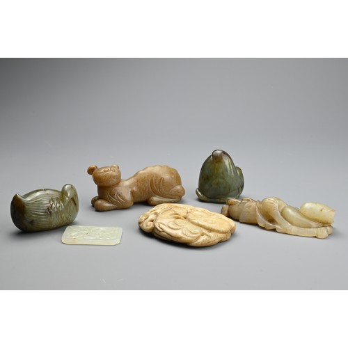 123 - SIX CHINESE JADE CARVINGS. Comprising: a pale jade plaque-shaped pendant, pierced with insects among... 