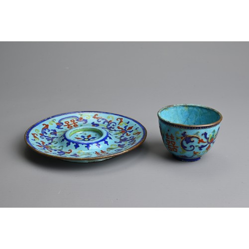 21 - A CHINESE CANTON ENAMEL CUP AND SAUCER, EARLY 20TH CENTURY. Light blue ground decorated with Shuangx... 