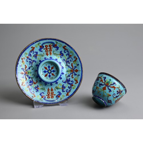 21 - A CHINESE CANTON ENAMEL CUP AND SAUCER, EARLY 20TH CENTURY. Light blue ground decorated with Shuangx... 