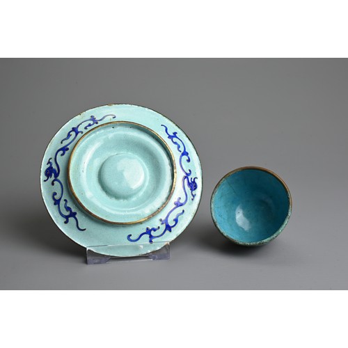 21 - A CHINESE CANTON ENAMEL CUP AND SAUCER, EARLY 20TH CENTURY. Light blue ground decorated with Shuangx... 